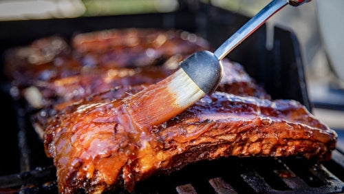 Bone-in BBQ beef rib rack, slow smoked and glazed