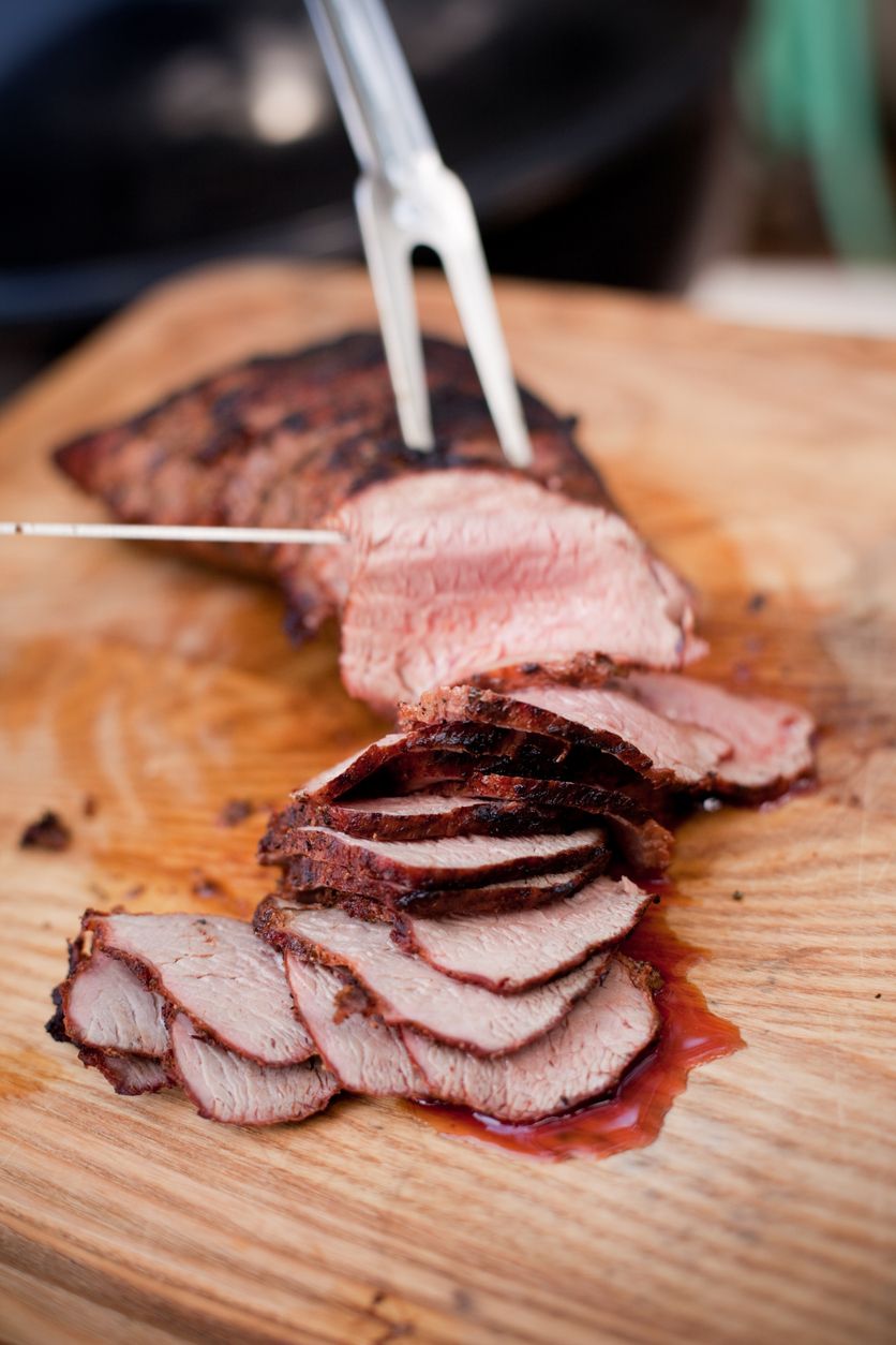 Grassfed beef tri-tip roast being carved, raised on pasture at Tyner Pond Farm in Indiana