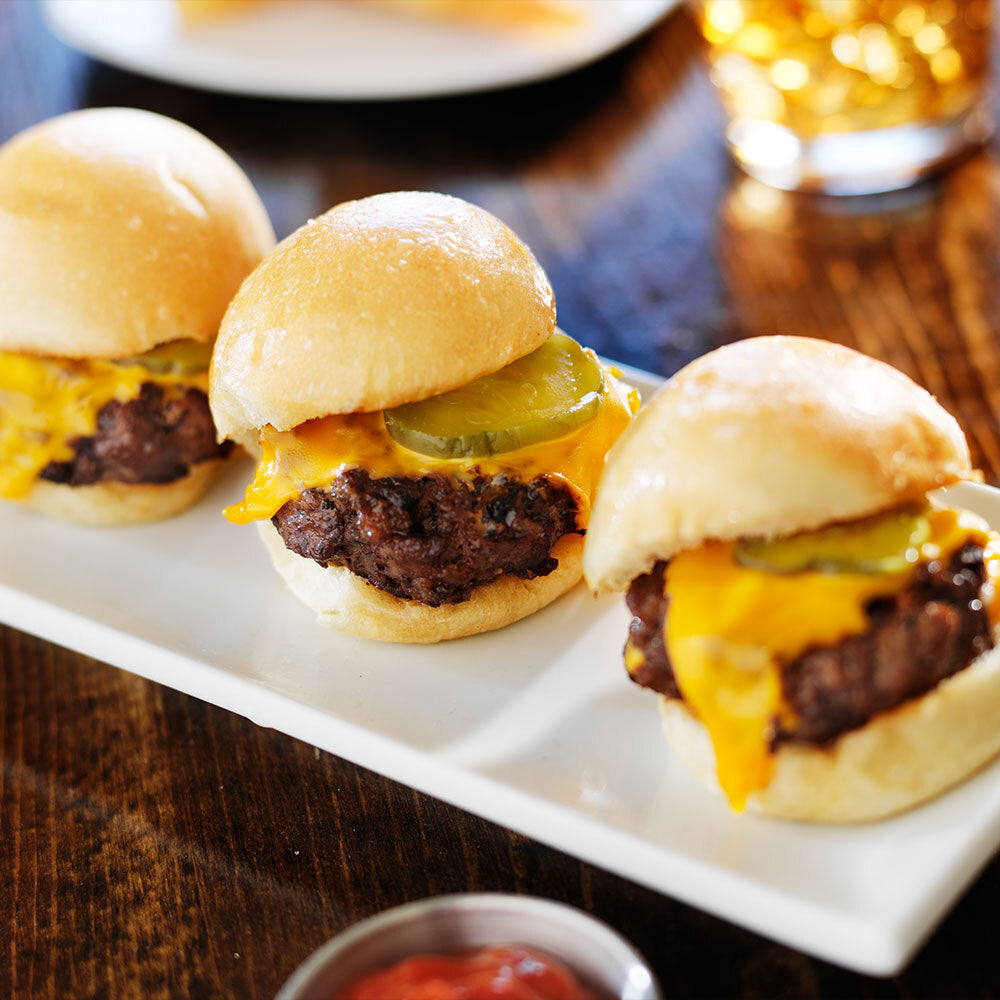 Grassfed beef slider on whole wheat bun, raised on pasture without grain or antibiotics