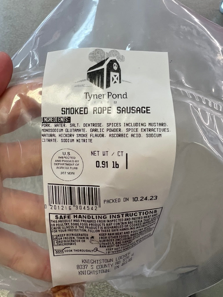 Product label showing ingredients and packaging for Tyner Pond Farm smoked rope sausage