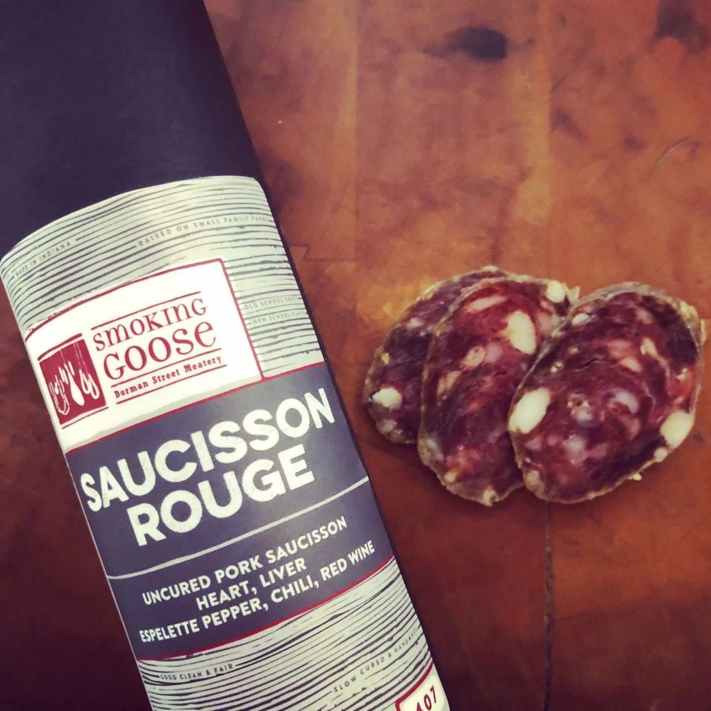 Smoking Goose Saucisson Rouge nose-to-tail pork salame with heart, liver, piment d’ville, red wine, chili, garlic, black peppercorns, and mustard