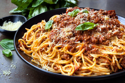 Spaghetti with hot Italian sausage bolognese sauce made from local pork