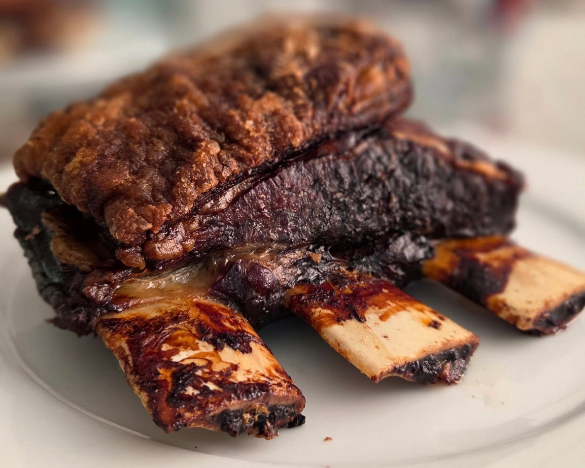 Grassfed beef short ribs from Tyner Pond Farm, bone-in cut about 2 lbs per pack, pasture-raised in Indiana.