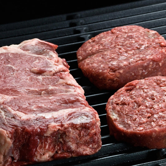Grassfed Steak and Burgers on a grill for B12 absorption
