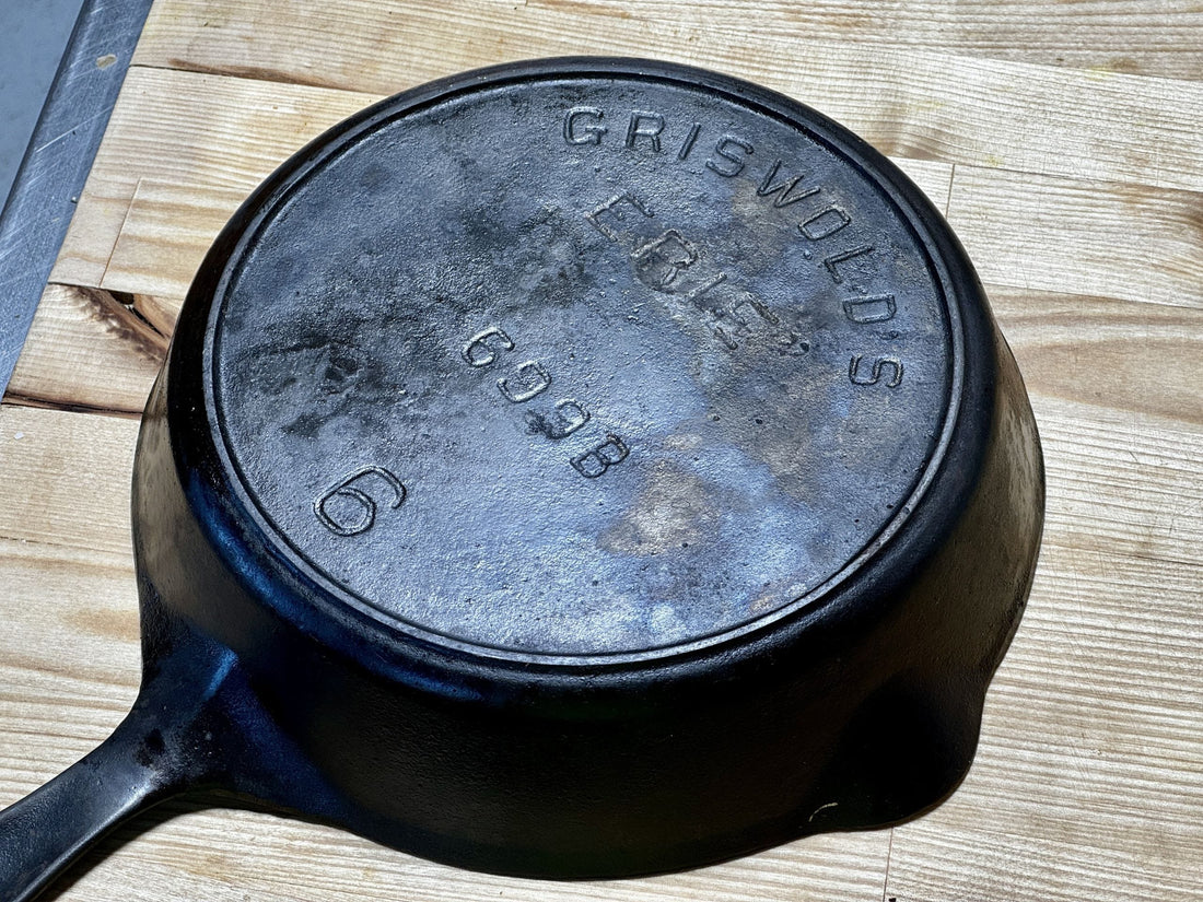 Griswold No. 6 cast iron skillet with slant logo and Erie marking, produced between 1906 and 1920, showing smooth surface and vintage craftsmanship