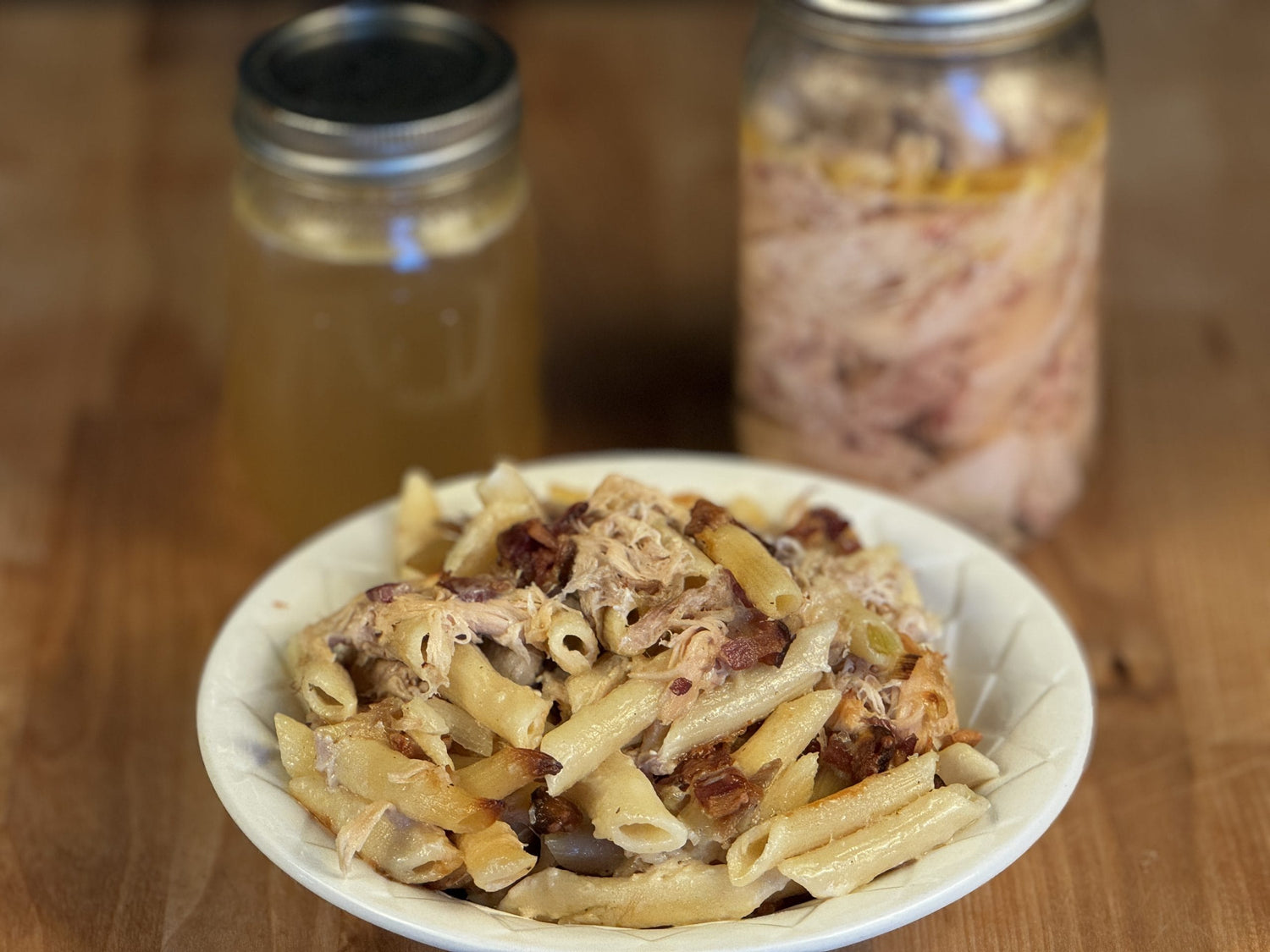 Chicken Bacon Ranch Casserole made with pasture-raised chicken from Tyner Pond Farm, shown with home-canned chicken and broth.