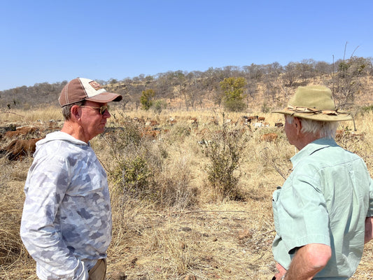 Chris Baggott studying Holistic Management with Allan Savory