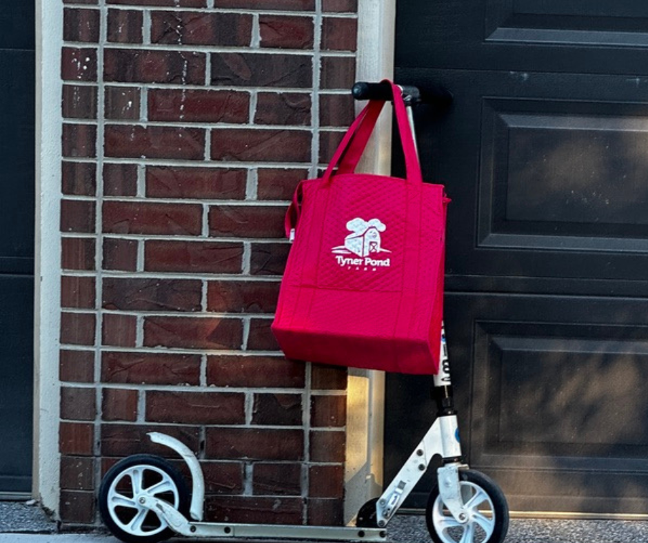 A Tyner Pond Home Delivery with a scooter