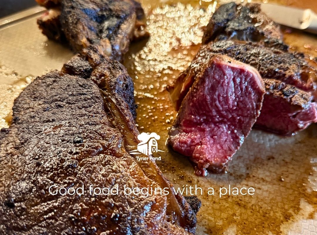 Grassfed steak sliced rare on a cutting board for a carnivore diet meal.