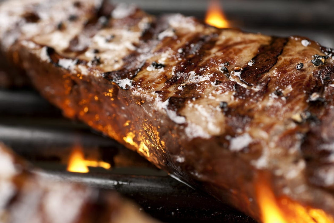 Grilling grass-finished New York strip steak from Tyner Pond Farm in Indiana