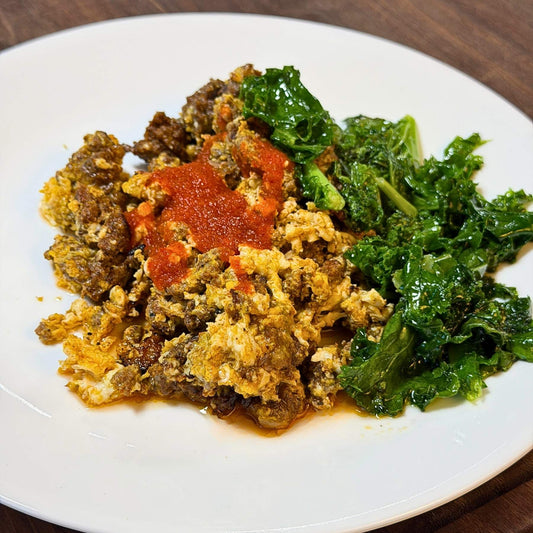 High protein breakfast with grassfed beef, eggs, and greens from a local Indiana farm