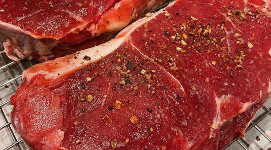 Raw grass-fed beef steak from Tyner Pond Farm, a complete protein with all essential amino acids.