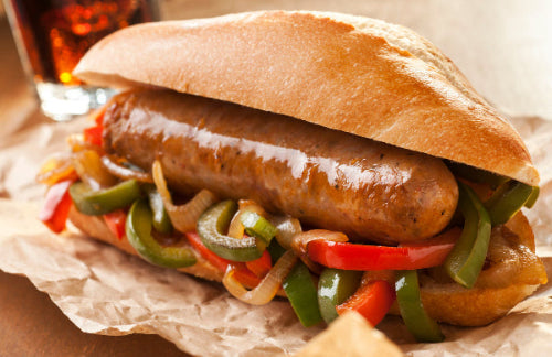 Hot Italian Saisage on Italian bun with peppers and onions