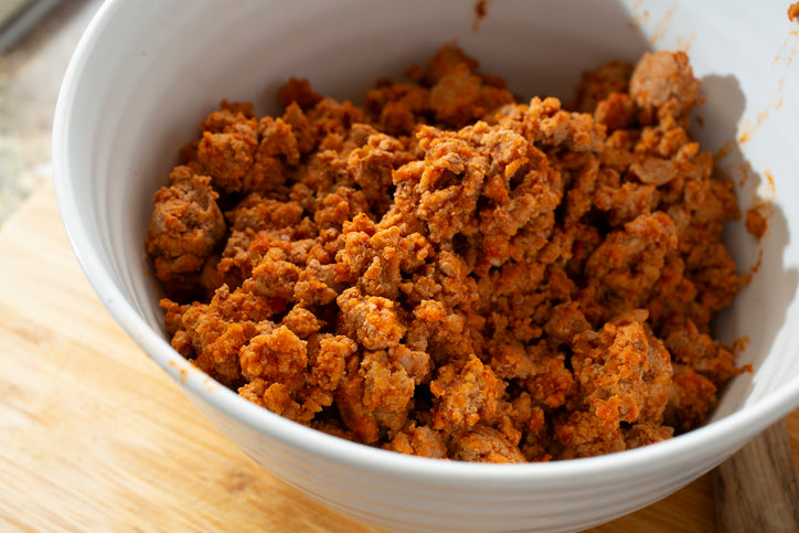Cooked ground chorizo served in bowl, richly seasoned and browned