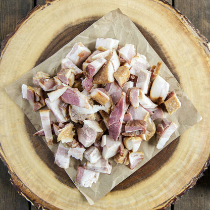 Diced ham pieces on butcher paper, fully cooked and ready to use