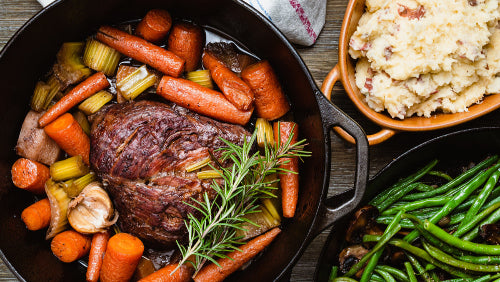 Chunks of rump roast simmering in Dutch oven stew, from pasture-raised beef