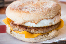 English muffin breakfast sandwich with egg, cheese, and sausage made from raw bulk sausage