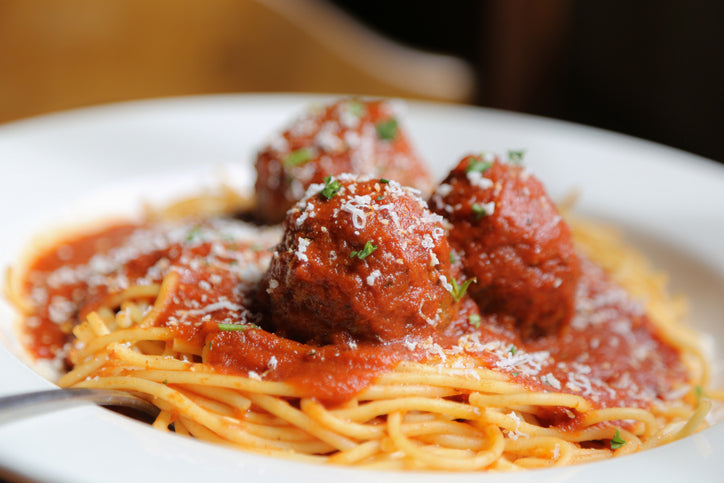 Spaghetti and meatballs made with ground pastured pork Italian sausage