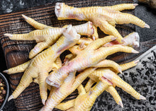 Pile of raw chicken feet from pasture-raised birds, labeled for pet use only, Tyner Pond Farm