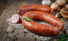 Smoked kielbasa sausage on countertop, made from local all-natural pork