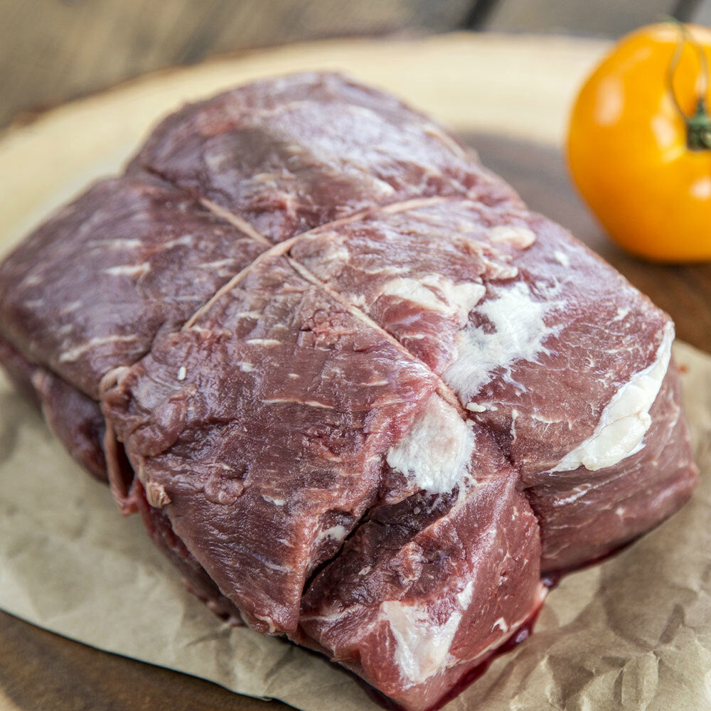 Raw tied rump roast from grassfed beef, ready for oven roasting