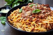 Spaghetti with hot Italian sausage bolognese sauce made from local pork