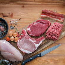 Tyner Pond Farm favorites bundle with grassfed beef, pasture-raised chicken, bacon, pork chops, ribeye steak, ground beef, and eggs for local delivery in central Indiana